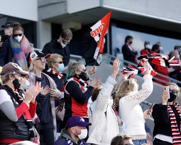 St Kilda fans celebrate the win during the 2021 AFL Round 23 match between the St Kilda Saints and the Fremantle Dockers at Blundstone Arena on...