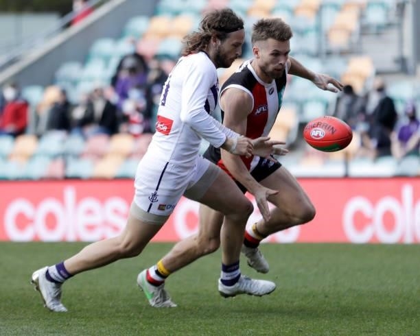 James Aish of the Dockers and Dan Butler of the Saints compete for the ball during the 2021 AFL Round 23 match between the St Kilda Saints and the...