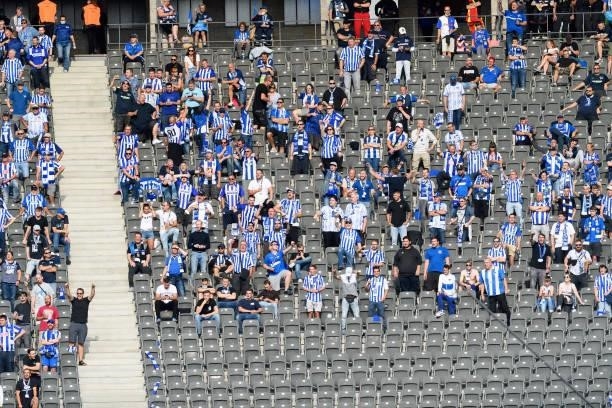 Supporters of Hertha BSC during the Bundesliga match between Hertha BSC and VfL Wolfsburg at Olympiastadion on August 21, 2021 in Berlin, Germany.
