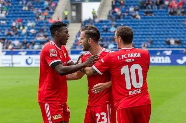 Niko Giesselmann of 1.FC Union Berlin celebrates after scoring his team's first goal with teammates during the Bundesliga match between TSG...