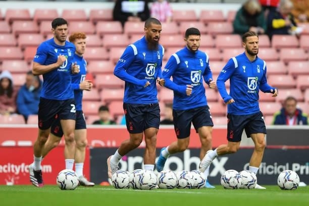 The Reds take to the pitch to warm-up ahead of kick-off during the Sky Bet Championship match between Stoke City and Nottingham Forest at the Bet365...