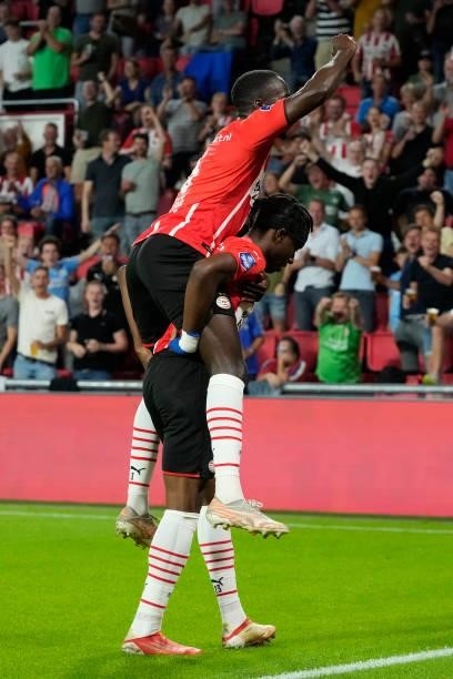 Noni Madueke of PSV celebrates 3-0 with Jordan Teze of PSV during the Dutch Eredivisie match between PSV v SC Cambuur at the Philips Stadium on...