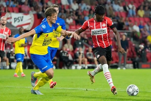 Erik Schouten of SC Cambuur, Noni Madueke of PSV scores his goal to make it 3-0 during the Dutch Eredivisie match between PSV v SC Cambuur at the...