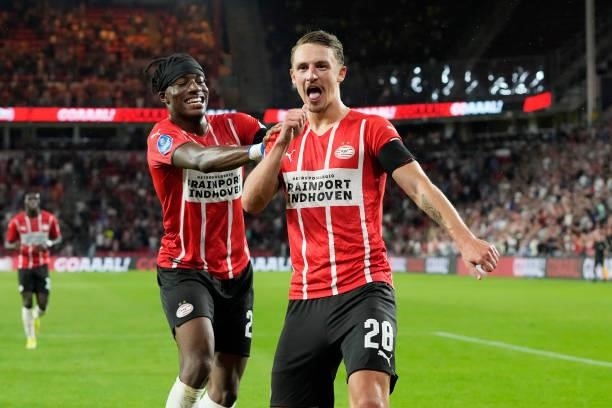 Olivier Boscagli of PSV celebrates 4-1 with Noni Madueke of PSV during the Dutch Eredivisie match between PSV v SC Cambuur at the Philips Stadium on...
