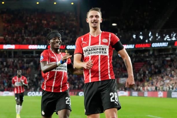 Olivier Boscagli of PSV celebrates 4-1 with Noni Madueke of PSV during the Dutch Eredivisie match between PSV v SC Cambuur at the Philips Stadium on...