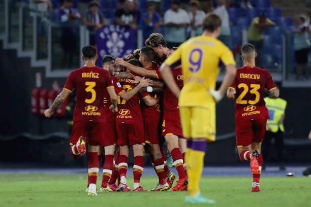 Henrikh Mkhitaryan with his teammates of AS Roma celebrates after scoring the opening goal during the Serie A match between AS Roma v ACF Fiorentina...