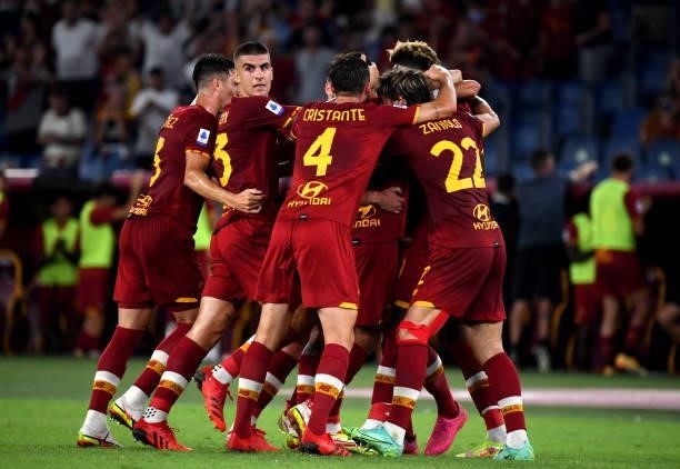 Henrik Mkhitaryan of AS Roma celebrates with team mates after scores his goal during the Serie A match between AS Roma v ACF Fiorentina at Stadio...
