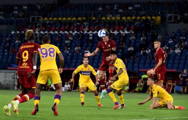 Nicolo Zaniolo of AS Roma head the ball against Erick Pulgar of ACF Fiorentina ,during the Serie A match between AS Roma v ACF Fiorentina at Stadio...