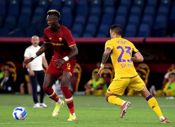 Tammy Abraham of AS Roma competes for the ball with Lorenzo Venuti of ACF Fiorentina ,during the Serie A match between AS Roma v ACF Fiorentina at...