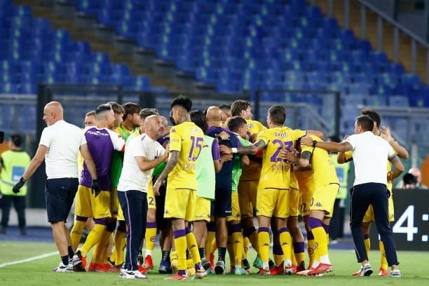 Nikola Milenkovic of ACF Fiorentina celebrates after scoring his team's first goal with team mates during the Serie A match between AS Roma and ACF...