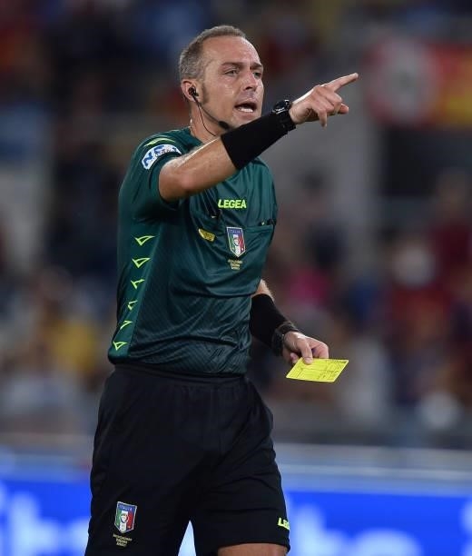 Referee Luca Pairetto gestures during the Serie A match between AS Roma and ACF Fiorentina at Stadio Olimpico on August 22, 2021 in Rome, Italy.