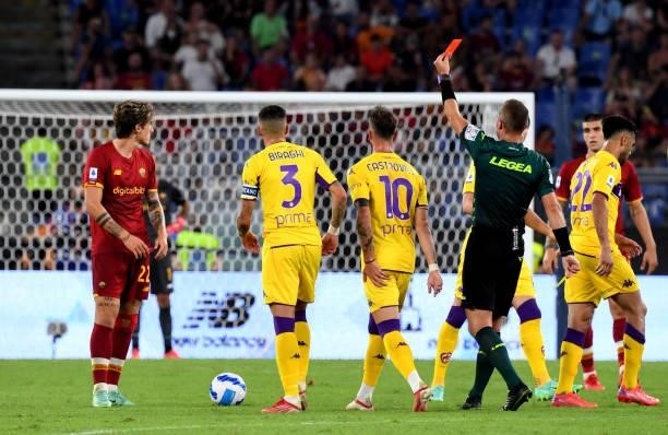 Nicolo Zaniolo of AS Roma leaves the pitch after being sent off after receiving a second yellow card by referee Luca Pairetto during the Serie A...