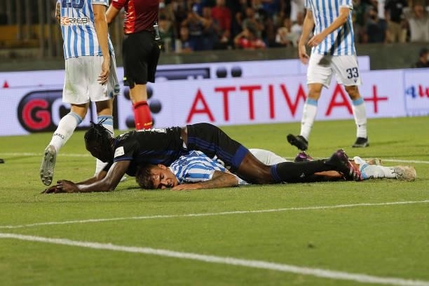 Idrissa Toure' of Pisa Calcio and Alessandro Tripaldelli fair play during the SERIE B match between Pisa Calcio and SPAL at Arena Garibaldi on August...