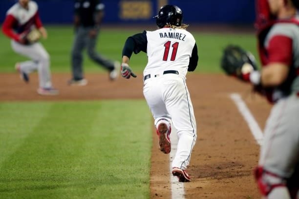 José Ramírez of the Cleveland Indians runs to first base during the game between the Los Angeles Angels and the Cleveland Indians at Historic Bowman...