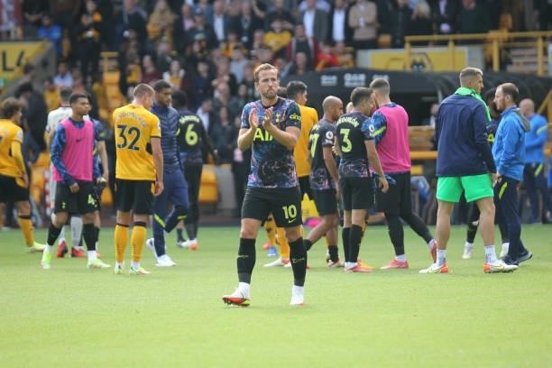 Harry Kane of Tottenham Hotspur applauds the travelling Spurs fans after the Premier League match between Wolverhampton Wanderers and Tottenham...