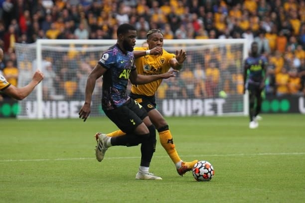 Japhet Tanganga of Tottenham Hotspur battles for the ball during the Premier League match between Wolverhampton Wanderers and Tottenham Hotspur at...