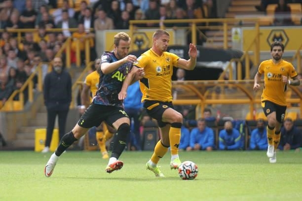 Harry Kane of Tottenham Hotspur in a tussle during the Premier League match between Wolverhampton Wanderers and Tottenham Hotspur at Molineux,...