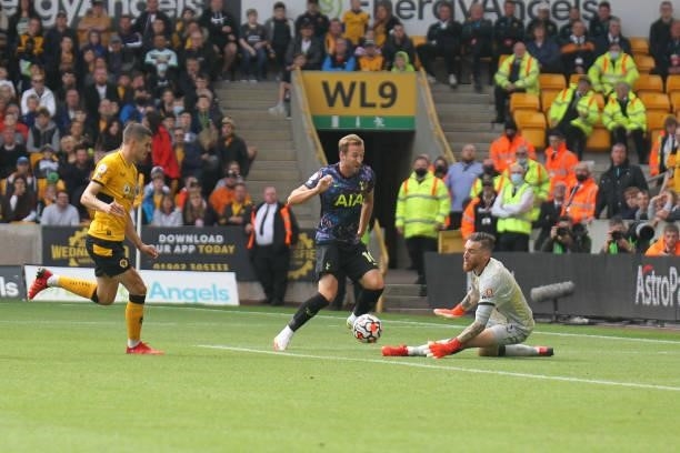 Harry Kane of Tottenham Hotspur takes a shot during the Premier League match between Wolverhampton Wanderers and Tottenham Hotspur at Molineux,...