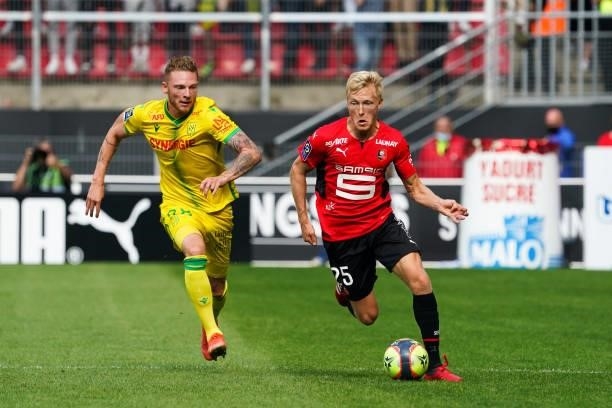 Birger MELING of Rennes and Renaud EMOND of Nantes during the Ligue 1 Uber Eats match between Rennes and Nantes at Roazhon Park on August 22, 2021 in...
