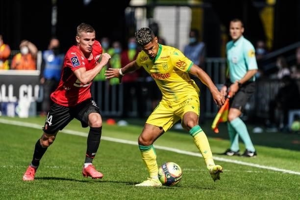 Benjamin BOURIGEAUD of Rennes and Ludovic BLAS of Nantes during the Ligue 1 Uber Eats match between Rennes and Nantes at Roazhon Park on August 22,...