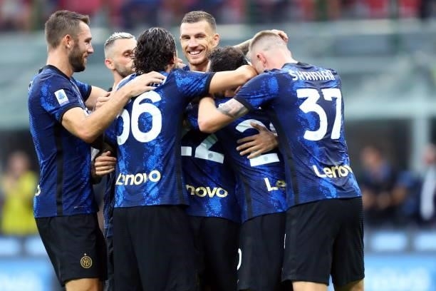Edin Dzeko of FC Internazionale and Hakan Calhanoglu of FC Internazionale celebrates after scoring his team's fourth goal with team mates during the...
