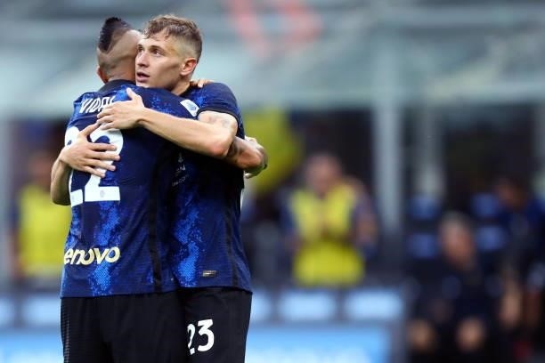 Arturo Vidal of FC Internazionale and Nicolo Barella of FC Internazionale celebrate after winning during the Serie A match between FC Internazionale...