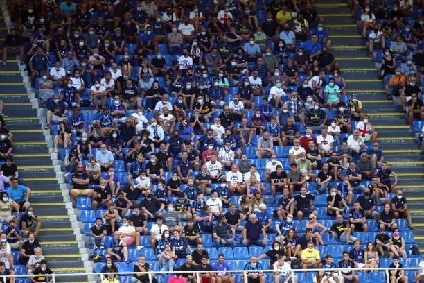 Supporters of Fc Internazionale during the Serie A match between FC Internazionale and Genoa CFC at Stadio Giuseppe Meazza on August 21, 2021 in...
