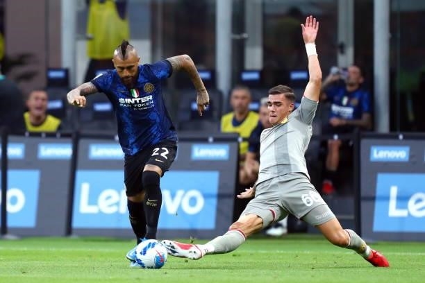 Arturo Vidal of FC Internazionale and Laurens Serpe of Genoa CFC battle for the ball during the Serie A match between FC Internazionale and Genoa CFC...