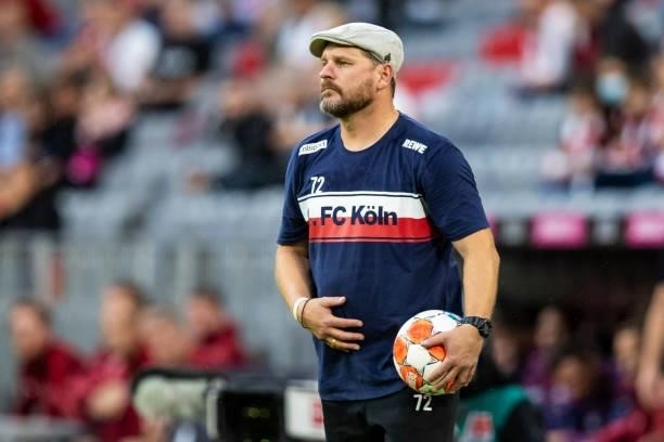 Head coach Steffen Baumgart of 1. FC Koeln has the ball in his hand during the Bundesliga match between FC Bayern Muenchen and 1. FC Koeln at Allianz...