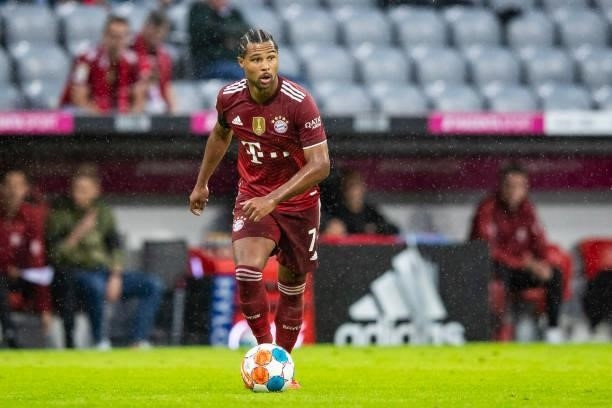 Serge Gnabry of Bayern Muenchen compete during the Bundesliga match between FC Bayern Muenchen and 1. FC Koeln at Allianz Arena on August 22, 2021 in...