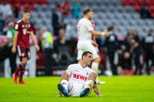 Ellyes Skhiri of 1. FC Koeln on the ground during the Bundesliga match between FC Bayern Muenchen and 1. FC Koeln at Allianz Arena on August 22, 2021...