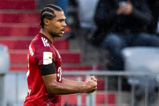 Serge Gnabry of Bayern Muenchen celebrates after scoring his teams 3:2 goal during the Bundesliga match between FC Bayern Muenchen and 1. FC Koeln at...