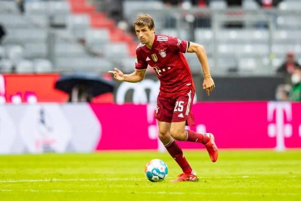 Thomas Mueller of Bayern Muenchen compete during the Bundesliga match between FC Bayern Muenchen and 1. FC Koeln at Allianz Arena on August 22, 2021...