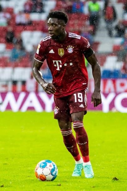 Alphonso Davies of Bayern Muenchen compete during the Bundesliga match between FC Bayern Muenchen and 1. FC Koeln at Allianz Arena on August 22, 2021...
