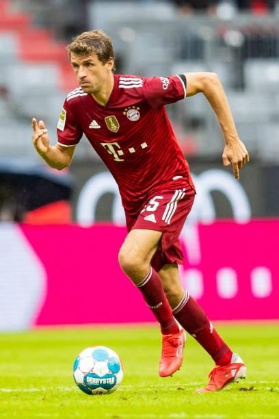 Thomas Mueller of Bayern Muenchen compete during the Bundesliga match between FC Bayern Muenchen and 1. FC Koeln at Allianz Arena on August 22, 2021...