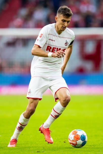 Dejan Ljubicic of 1. FC Koeln compete during the Bundesliga match between FC Bayern Muenchen and 1. FC Koeln at Allianz Arena on August 22, 2021 in...