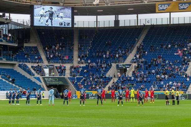 Minute of silence for Gerd Mueller prior to the Bundesliga match between TSG Hoffenheim and 1. FC Union Berlin at PreZero-Arena on August 22, 2021 in...