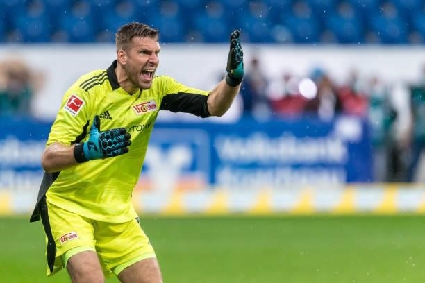 Goalkeeper Andreas Luthe of 1.FC Union Berlin gestures during the Bundesliga match between TSG Hoffenheim and 1. FC Union Berlin at PreZero-Arena on...
