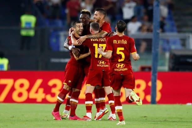 Henrikh Mkhitaryan of AS Roma celebrates after scoring his team's first goal with team mates during the Serie A match between AS Roma and ACF...
