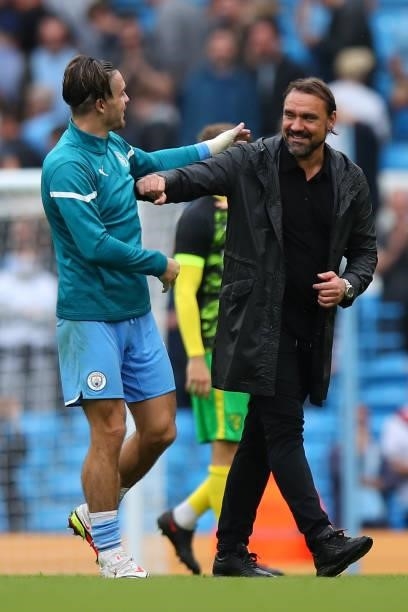 Jack Grealish of Manchester City and Daniel Farke the head coach / manager of Norwich City during the Premier League match between Manchester City...