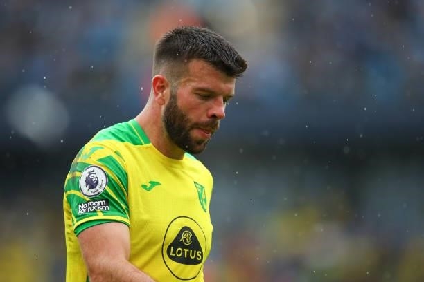 Grant Hanley of Norwich City during the Premier League match between Manchester City and Norwich City at Etihad Stadium on August 21, 2021 in...