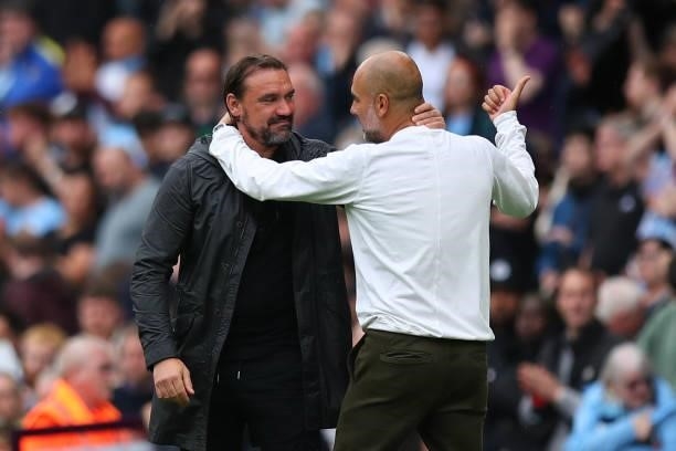 Daniel Farke the head coach / manager of Norwich City and Pep Guardiola the head coach / manager of Manchester City during the Premier League match...