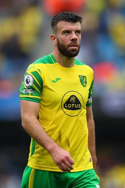 Grant Hanley of Norwich City during the Premier League match between Manchester City and Norwich City at Etihad Stadium on August 21, 2021 in...