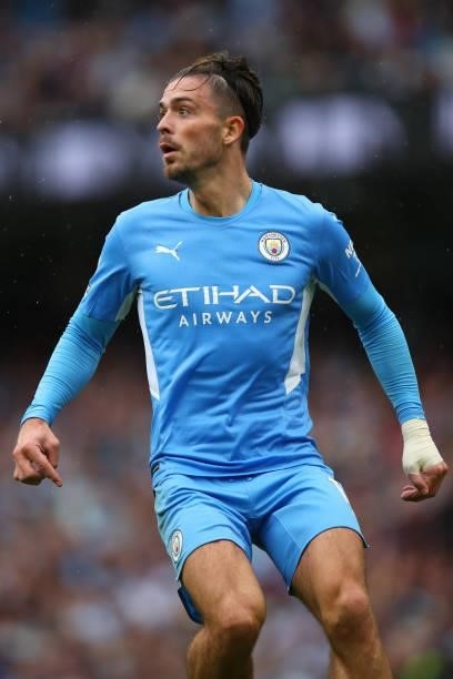 Jack Grealish of Manchester City uring the Premier League match between Manchester City and Norwich City at Etihad Stadium on August 21, 2021 in...