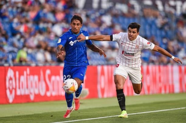 Damian Suarez and Marcos Acuna during La Liga match between Getafe CF and Sevilla FC at Coliseum Alfonso Perez on August 23, 2021 in Getafe, Spain.