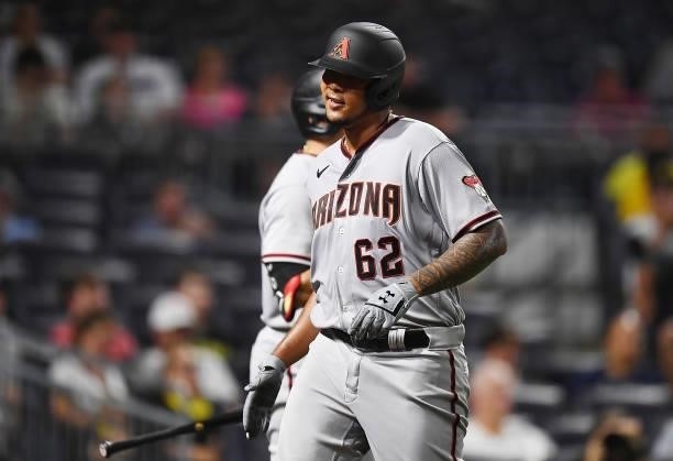 Humberto Mejia of the Arizona Diamondbacks reacts after scoring during the fifth inning against the Pittsburgh Pirates at PNC Park on August 23, 2021...