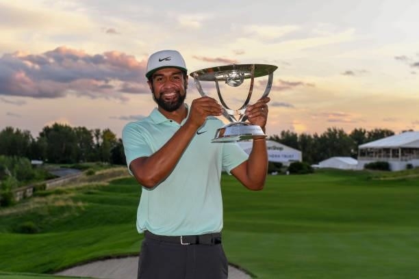 Tony Finau poses with the trophy after winning in a playoff during the weather delayed final round of THE NORTHERN TRUST at Liberty National Golf...
