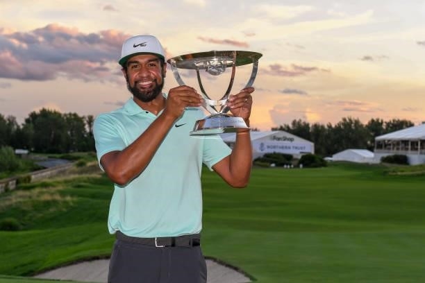 Tony Finau poses with the trophy after winning in a playoff during the weather delayed final round of THE NORTHERN TRUST at Liberty National Golf...