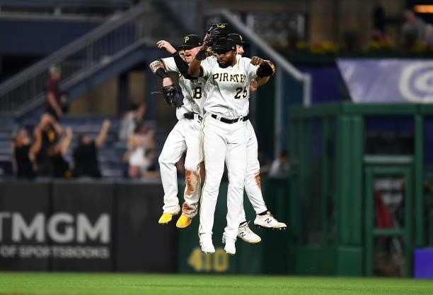 Ben Gamel, Gregory Polanco and Bryan Reynolds of the Pittsburgh Pirates celebrate after a 6-5 win over the Arizona Diamondbacks at PNC Park on August...