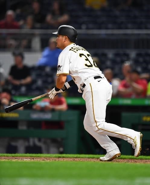 Yoshi Tsutsugo of the Pittsburgh Pirates watches his solo home run during the seventh inning against the Arizona Diamondbacks at PNC Park on August...